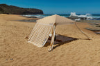 The Esperance Cabana with golden yellow and white striped canopy set up outdoors